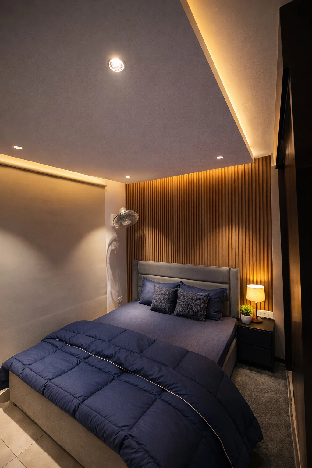 Bedroom at night with warm cove lighting