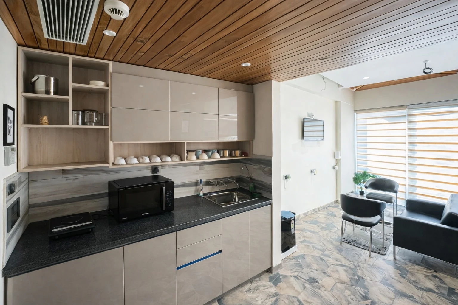 Open kitchen with dining and lounge area